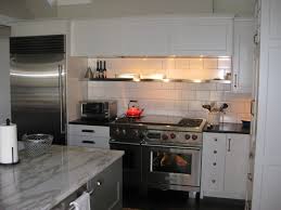 Stainless Steel Shelving Above Range With Warming Lights Above To Keep Casseroles Warm Before Servi Kitchen Remodel Inspiration Kitchen Design Kitchen Flooring