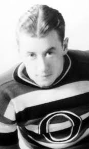 Who wore the first number 99 in hockey?