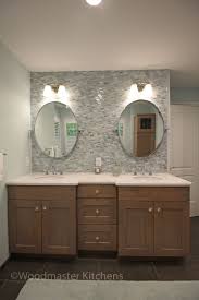 In this video, i build the base cabinet for the bathroom vanity. The Earthy Tones Of The Crystal Cabinets Bathroom Cabinetry In Pebble Stain On Alder Combined With The Bathroom Design Bathroom Cabinets Diy Bathroom Cabinets