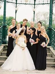 A Chic And Modern Wedding Black Gold And Vanilla Wedding Inspiration Unusual Wedding Dresses Floral Bridesmaid Dresses Wedding Dresses Unique