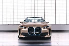 Cross a bmw 4 series with an ix, and you get this: Bmw Teases The Electric I4 Concept A Sleek And Powerful Tesla Rival