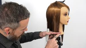 The standard parting method taught in cosmetology schools requires diving the scalp into 7 sections: How To Hold Sections To Create A Consistent One Length Haircut Youtube