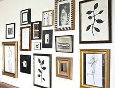 Black And White Wall Collage Ideas Gallery Wall White Frames Mixed With Gold Frames And Black White Photos Kids Art Gold Frame Gallery Wall Gold Gallery Wall Gallery Wall Frames