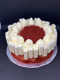 In a separate jug, whisk together eggs, oil, buttermilk, food coloring, and vanilla. Red Velvet Cake With Cream Cheese Icing And White Chocolate Kit Kat Kit Kat Dessert Desserts Sweets Cake