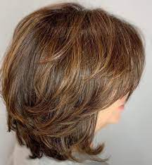 Medium Shaggy Bob With Subtle Highlights Modern Shag Haircut Medium Shag Haircuts Medium Hair Styles