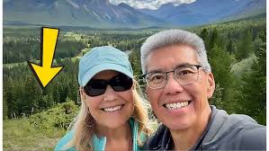 Hiker takes photo in woods, looks behind wife and realises something  terrible is following them