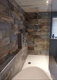 However, notice how the flooring covers the entire shower floor. Wood Tile Shower Ideas 13 Decorathing