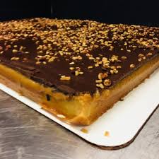 This salted caramel cheesecake recipe is a super easy to make, no bake cheesecake recipe. Dessert Bars Chocolate Covered Salted Caramel Aggie S Bakery Cake Shop