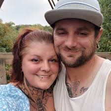 What could be causing Toyota Carina e engine rough idling after cold start?