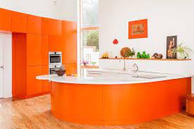 The kitchen is one of the best places to experiment with color weights, like this design's trendy mint green and teal color palette. 10 Beautiful Kitchens With Orange Walls