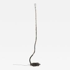 Mounted on double black marble base with a brass flower design on base. Franz West Franz West Floor Lamp For Meta Memphis