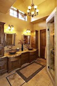 You can add a darker shade of sponge over the light base. Tuscan Bathroom Design With Small Chandelier And Yellow Walls Inviting Tuscan Bathroom Design Ga Tuscan Bathroom Decor Tuscan Bathroom Bathroom Design Luxury