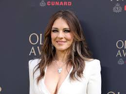 Elizabeth Hurley Wears Sheer White Lace for Patio Lunch Date