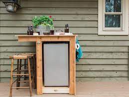 Build a mini refrigerator storage cabinet. How To Build An Outdoor Minibar Hgtv