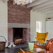 Shiplap is a type of wooden wall siding that uses horizontal boards to achieve the look of give a painted brick fireplace design a try. 75 Beautiful Living Room With A Brick Fireplace Pictures Ideas July 2021 Houzz