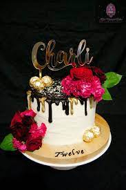 Buttercream Cake With Black Chocolate Drip And Red And Burgundy Fresh Flowers Gold Cake Topper Green Birthday Cakes Chocolate Drip Cake Cake