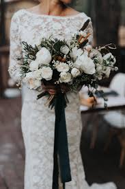 We did not find results for: This Elegant Cabin Wedding Inspiration Is A Modern Winter Wonderland Junebug Weddings Winter Wedding Bouquet Winter Bridal Bouquets Cabin Wedding