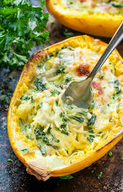 Cheesy Garlic Parmesan Spinach Spaghetti Squash Recipe Recipes Vegetarian Dishes Veggie Dishes