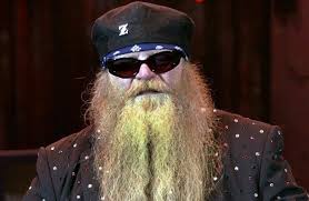 Zz top bassist dusty hill, one of the texas blues rock trio's bearded figures, died at his houston home, the band announced wednesday. 0wl6hrtzs2tbm