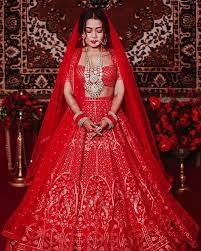 Recently, her wedding card was leaked online. Neha Kakkar S Red Falguni Shane Peacock Lehenga Will Remind You Of Priyanka Chopra S Bridal Outfit Vogue India