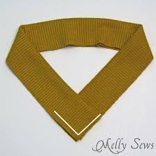 This video will take you step by step through sewing the neckband and attaching it to the shirt and has lots of tips and tricks and recommendations. How To Sew A V Neck T Shirt Melly Sews