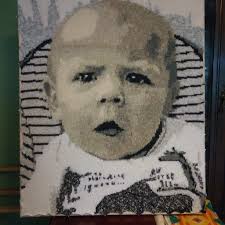 For a long time, I wondered about the possibility of knitting a portrait.  After a year of meticulous planning and dedicated knitting, behold the  result! The knitting pattern I created is entirely