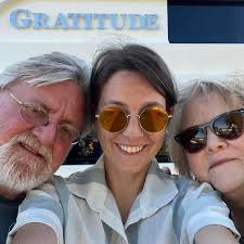 What local food banks and churches help families with holidays in Grand Bay?