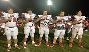 Trojans Win First District Game Against St. Andrews