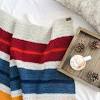 Anthropologie rives striped throw blanket, $, available at anthropologie. 1