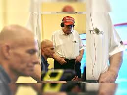 Trump golf attire: MAGA hat, polo shirt: Trump seen in golf attire while  watching Yemen airstrike he ordered - The Economic Times