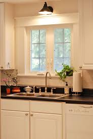 The light source above the crystals and faceted czechoslovakian crystal chain creates a beautiful sparkle unlike traditional candle style chandeliers which do not illuminate the crystals hanging below. Wonderful Photos Kitchen Lighting Over Sink Suggestions Farmhouse Kitchen Lighting Country Kitchen Lighting Modern Kitchen Lighting