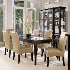 Incredible design ideas for your dining room. Small Space Dining Room Ideas Along Brown Leather Chair Black Stained Wood Homifind