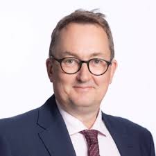 A woman from Greater Manchester who unexpectedly gave birth at home has  been reunited with ambulance staff who helped with the delivery of her  daughter.