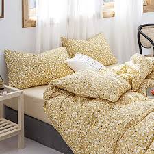 Yellow patterned chairs sit in front of the tufted bed that's flanked by wooden nightstands and this primary bedroom features cushioned chairs and a lovely canopy bed dressed in yellow floral bedding. Vclife Yellow Floral Bedding Sets Twin Cotton Duvet Cover Sets White Flowers Printed On Yellow Bedding 1 Botanical Quilt Cover And 2 Pillowcases Zipper Closure Wrinkle Free Lightweight Soft Wantitall