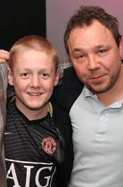 He comes across a few skinheads on his way home from school, after a fight. Stephen Graham Actor