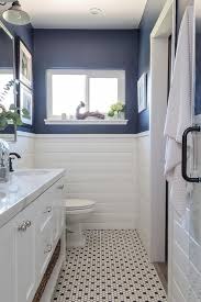 White Shiplap Bathroom Walls Accented With A Blue Upper Wall And Complement Black And White Hex Shiplap Bathroom Wall Navy Bathroom Decor Blue White Bathrooms