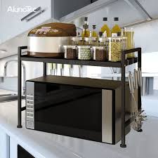 Search for stainless steel cabinets. Adjusted 2 Tiers Stainless Steel Microwave Oven Storage Stand Kitchen Rack Buy Microwave Oven Rack Kitchen Storage Rack Microwave Rack Product On Aluminum Pergola Alunotec