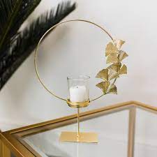These mosaic candle holders make a great pop of dimensional style in your entryway, dining table, or living room, especially during the holidays. Round Gold Lotus Flower Candle Holder