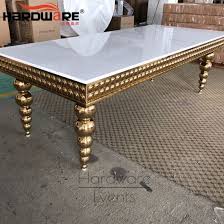 A dining table is the centerpiece of the room where families often spend the most time together, making the table essential to the creation of a welcoming atmosphere. China Gold Stainless Steel Legs French Style Mdf Top Luxury Dining Table China Dining Chair Glass Top Dining Tables