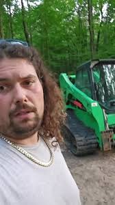 Cat Skid Steer 285 Loading 740 Dump