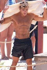 Baywatch lifeguard zac efron hoodie. Zac Efron Goes For A Shirtless Swim With Dwayne Johnson On The Set Of Baywatch Zac Efron Shirtless Zac Efron Baywatch Zac