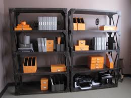 Did you scroll all this way to get facts about orange office decor? Orange Office Accessories In A Grey Industrial Space Creative Office Space Orange Office Grey Office