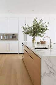 Is A Minimalist Kitchen Right For You 10 Designs To Help You Decide Minimalist Kitchen Interiors Modern Kitchen Design Minimalist Kitchen Design