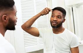 Sew in weave hairstyles braids hairstyles pictures african braids hairstyles african american hairstyles boy hairstyles hair pictures haircuts hairstyle ideas wedding hairstyles. Afro Hair Man Styling Photos Free Royalty Free Stock Photos From Dreamstime