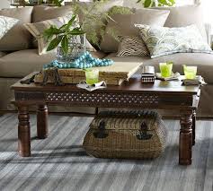 Leather coffee table round, title: Shanti Coffee Table Pottery Barn