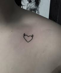 Small heart tattoo and the infinity sign on wrists. 35 Best Love Tattoo Designs That Showcase Your Love