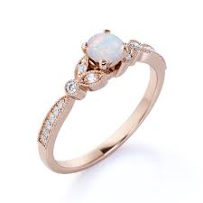Fire opals are also found in necklaces and bracelets as well and often serve as the centerpiece of new and used jewelry arrangements or collections. Jeenmata 1 25 Ct Round Natural Fire Opal Ring October Birthstone Vintage Engagement Ring 18k Rose Gold Over Silver Walmart Com In 2021 Engagement Rings Opal Gold Opal Engagement Ring Cute Engagement Rings