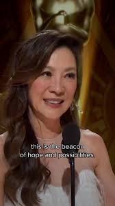 At the 95th Academy Awards, #MichelleYeoh made history, becoming the first  Asian woman to win an #Oscar for best actress. She dedicated the award to  her "superhero", her mother Janet Yeoh —