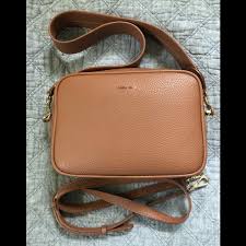 This is the angela roi grace micro in coral pink! Angela Roi Bags Angela Roi Grace Crossbody Brown Poshmark