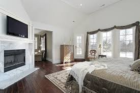 Image result for High ceiling bedroom traditional with reading lights wood floors natural lighting